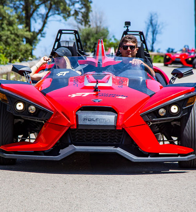 Formula Tours Mallorca cars parked at a viewpoint overlooking the sea near Peguera